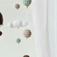 Baby Mobile Häkelliebe Otter beige/dunkelbraun/türkis